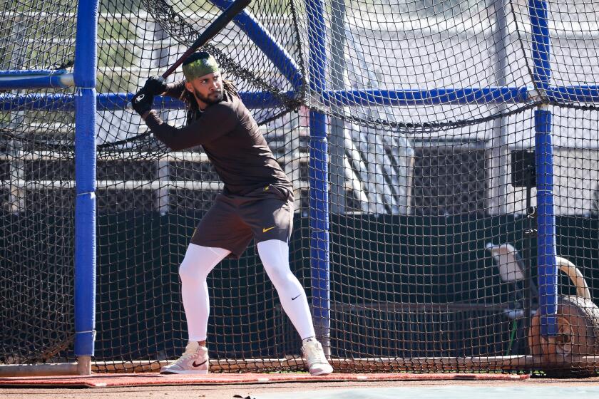 Peoria, AZ - February 13: Fernando Tatis Jr. takes batting practice during Padres spring training workouts at the Peoria Sports Complex on Tuesday, Feb. 13, 2024 in Peoria, AZ. (Meg McLaughlin / The San Diego Union-Tribune)