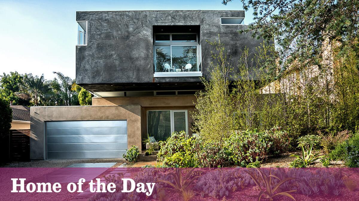 The custom-built contemporary is listed at $6.898 million.