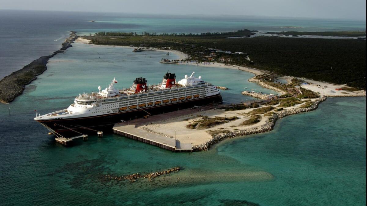 This undated photo shows a Disney Cruise Line ship docked at Castaway Cay, Disney's private island in the Bahamas.