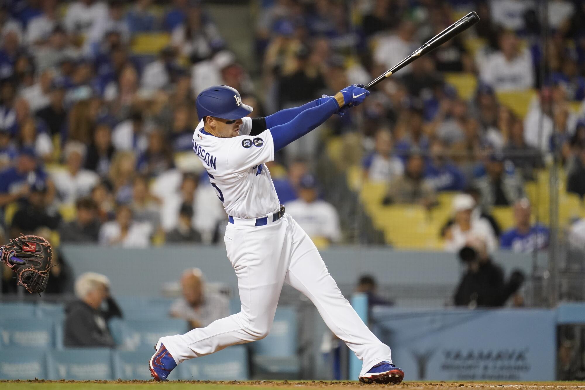 Los Angeles Dodgers designated hitter Trayce Thompson (25) hits a home run during the third inning.