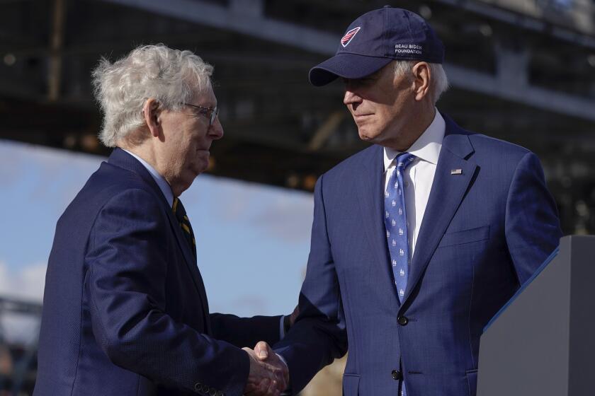 President Biden and Sen. Mitch McConnell after speaking about the infrastructure agenda in Covington, Ky.  