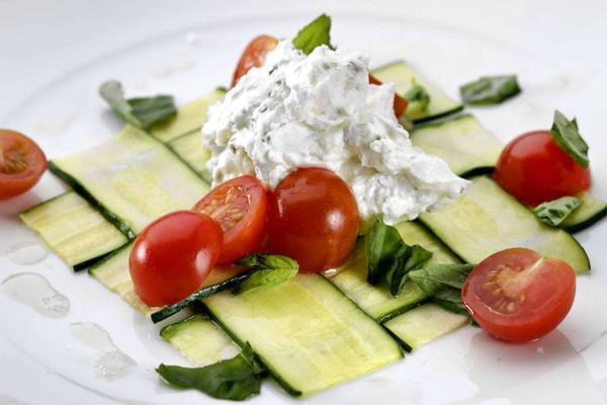 Woven zucchini with fresh goat cheese.