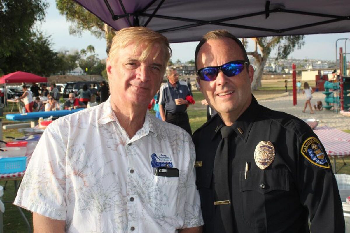 Pacific Beach Town Council member Greg Daunoras and San Diego police Lt. John Mayer attend the 2019 PAESAN event.