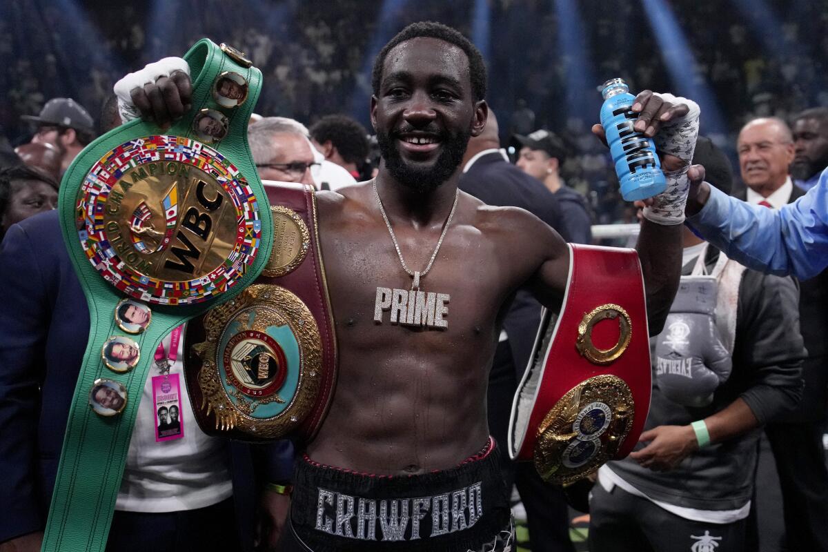 Terence Crawford celebrates his defeat of Errol Spence Jr 