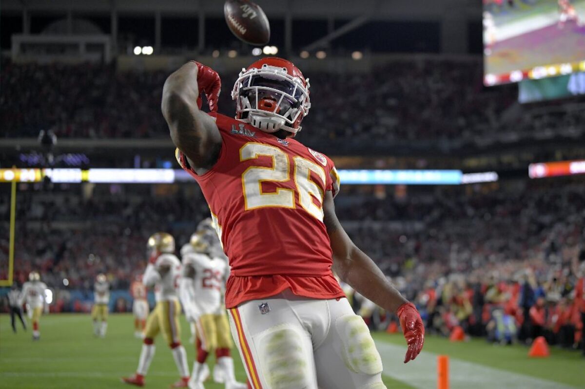 Kansas City Chiefs' Damien Williams, a Mira Mesa High graduate, celebrates his touchdown against the San Francisco 49ers during the second half of Super Bowl LIV on Sunday, Feb. 2, 2020, in Miami Gardens, Fla.