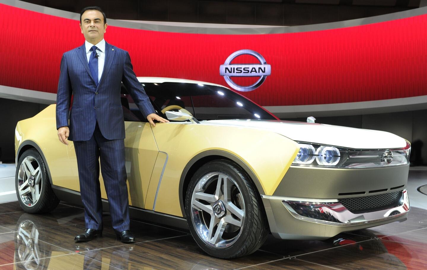 Nissan Motor President Carlos Ghosn poses in front of a IDx Freeflow at the company's booth at the Tokyo Motor Show 2013 in Tokyo on November 20, 2013. The biennial motor show, held from November 20 to December 1, features domestic makers of passenger cars, commercial vehicles and trucks alongside most of their European competitors. AFP PHOTO/Toru YAMANAKATORU YAMANAKA/AFP/Getty Images ** OUTS - ELSENT, FPG, TCN - OUTS * NM, PH, VA if sourced by CT, LA or MoD **