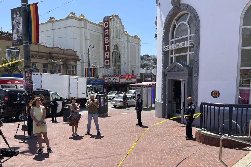 FILE - Police tape blocks the entrance to the Castro Muni Metro train station following a shooting in San Francisco on June 22, 2022. A man who shot and killed a passenger on a San Francisco subway commuter train will be charged with gun crimes but not homicide in what was “clearly" a case of self-defense after he was attacked with a knife, his attorney said Monday, June 27. Javon Green has a court hearing on Tuesday, June 28. (AP Photo/Janie Har, File)
