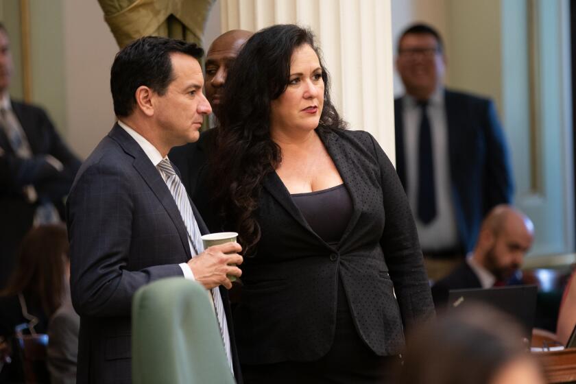 SACRAMENTO CA SEPTEMBER 9, 2019 -- Assembly Speaker Anthony Rendon (D-Lakewood) confers with Assemblywoman Lorena Gonzalez (D-San Diego) during floor session at the state Capitol on Aug. 29, 2019. (Robert Gourley / Los Angeles Times)