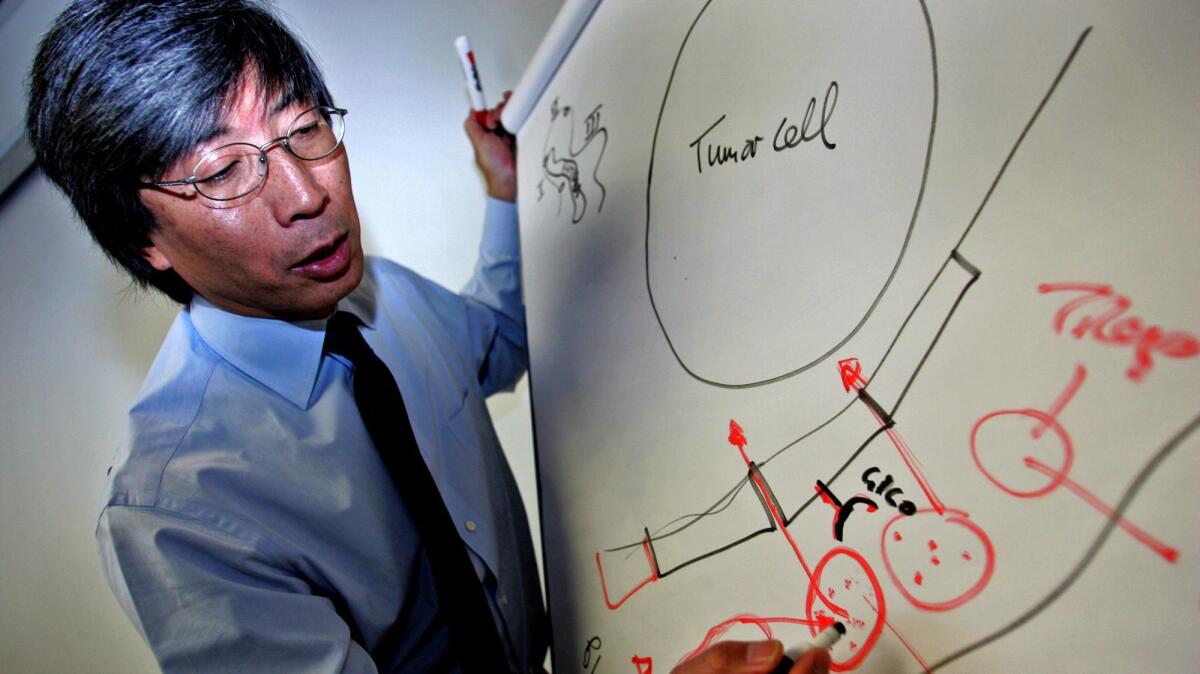 Patrick Soon-Shiong is chief executive of biotech firm NantHealth Inc. On Thursday, the company said it would reduce its staff by 300 and sell some assets to Allscripts.