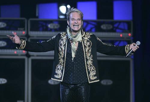 Original lead singer David Lee Roth was clearly happy to be back on stage with Van Halen in Los Angeles for the first time in more than two decades. The Pasadena-born band played a set of Roth-era material to a sold-out Staples Center crowd on Tuesday.