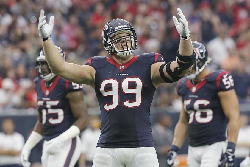 Texans defensive lineman J.J. Watt pumps up the crowd while playing against the Tampa Bay Buccaneers in Houston on Sept. 27.