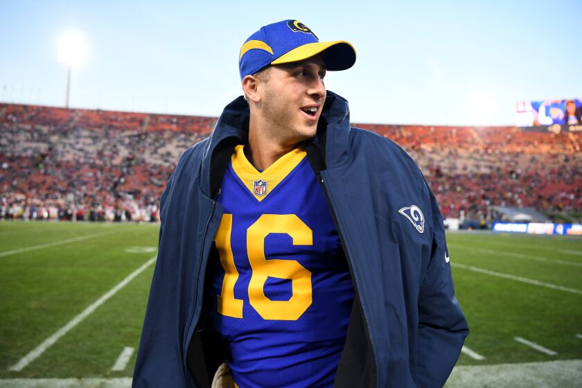 Rams quarterback Jared Goff stands on the sideline at the Coliseum during a win over the San Francisco 49ers on Dec. 30, 2018.