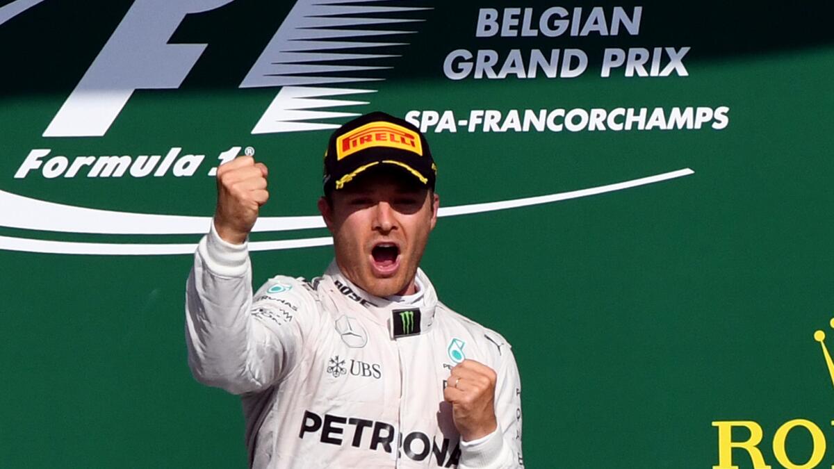 Formula One driver Nico Rosberg celebrates on the podium after winning the Belgian Grand Prix on Sunday.