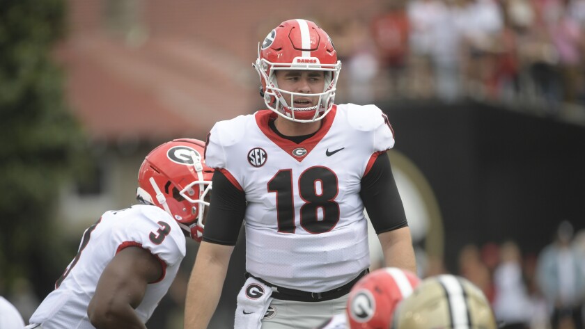 Georgia quarterback JT Daniels, who played just one quarter, looks over the Vanderbilt defense.