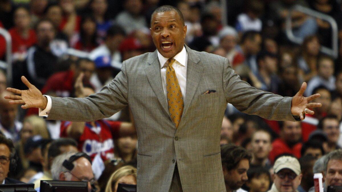 Then-Phoenix Suns coach Alvin Gentry argues with an official during a game against the Lakers in 2012. Gentry, who serves an associate head coach under Clippers Coach Doc Rivers, has drawn interest from NBA teams with coaching vacancies.