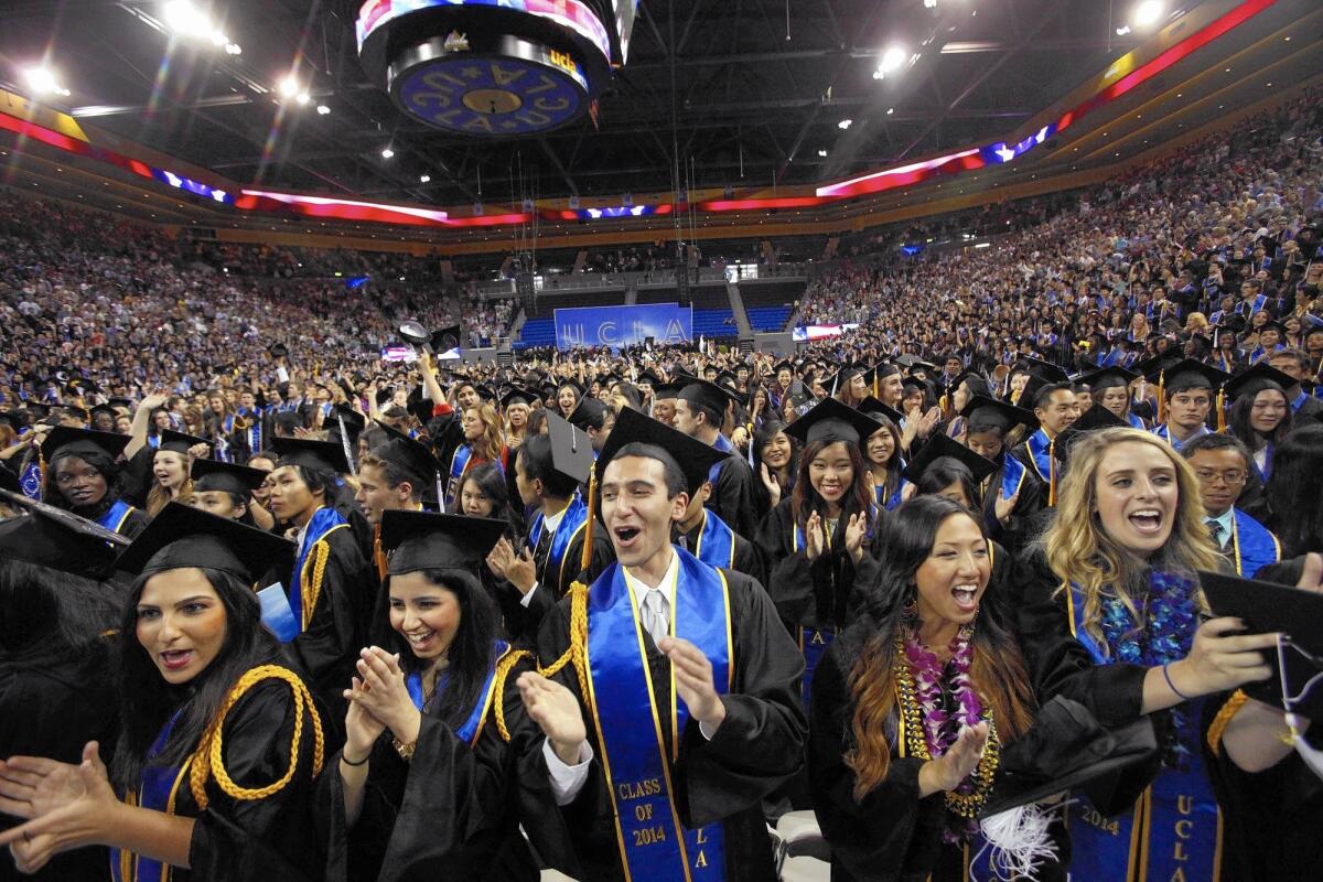 UCLA students cheer during commencement ceremonies at Pauley Pavilion in June. Nationally, only 19% of full-time students earn a bachelor’s degree in four years at most public universities and only 36% at highly rated flagship research institutions, according to a recent report.