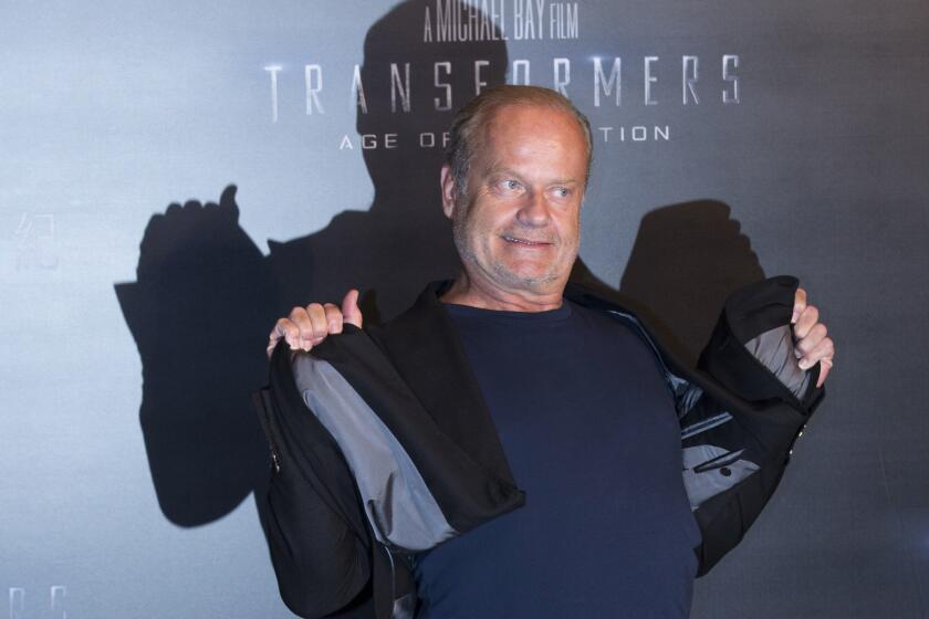 Kelsey Grammer, who struck a pose in June at a news conference before the "Transformers: Age of Extinction" world premiere in Hong Kong, has a mission on Twitter.