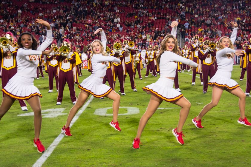 USC song girls Josie Bullen (far right) and Adrianna Robakowski (second from right).