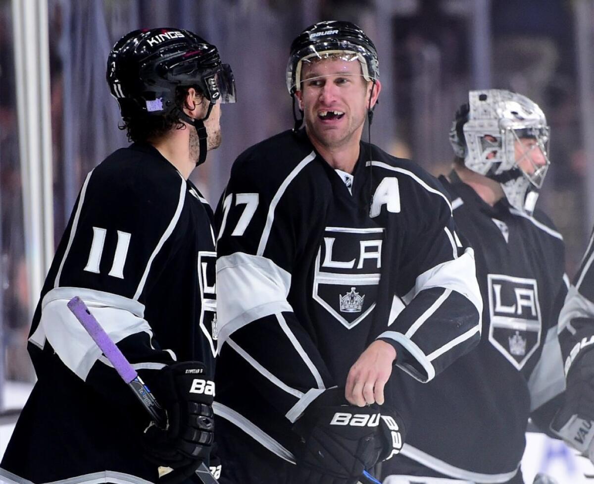 Kings forward Jeff Carter, center, reacts to his game-winning overtime goal against the Predators goal with Anze Kopitar (11) and Jonathan Quick (32) on Oct. 31.