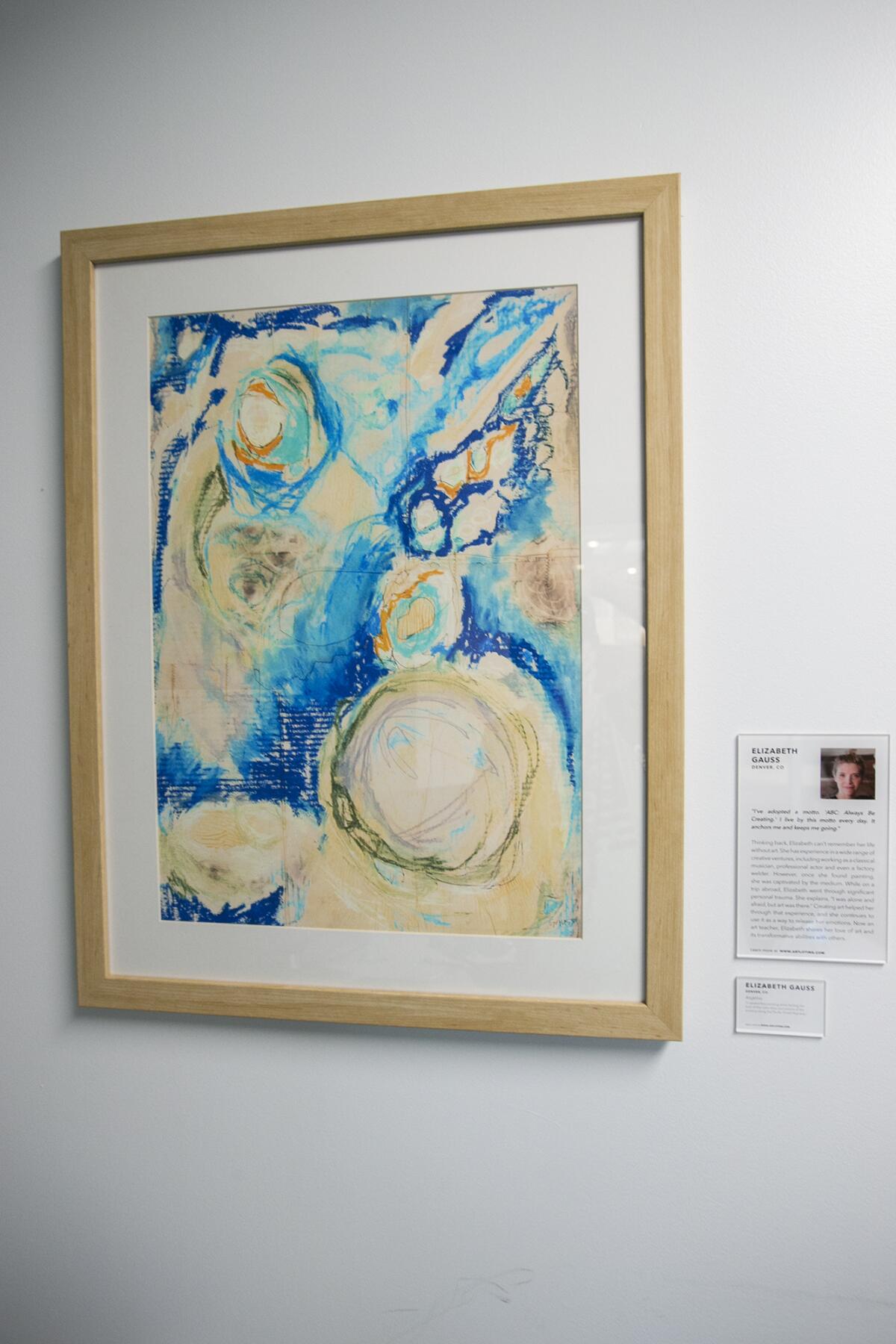 A piece by ArtLifting artist Elizabeth Gauss from Denver hangs in an office at the Bank of America in Huntington Beach.