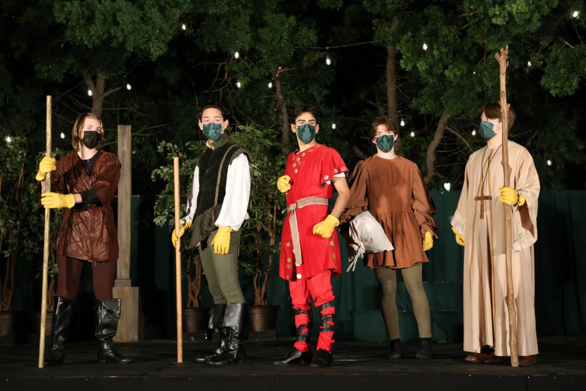 Robin Hood and his Merry Men perform during the  production of "Robin Hood and the White Arrow."