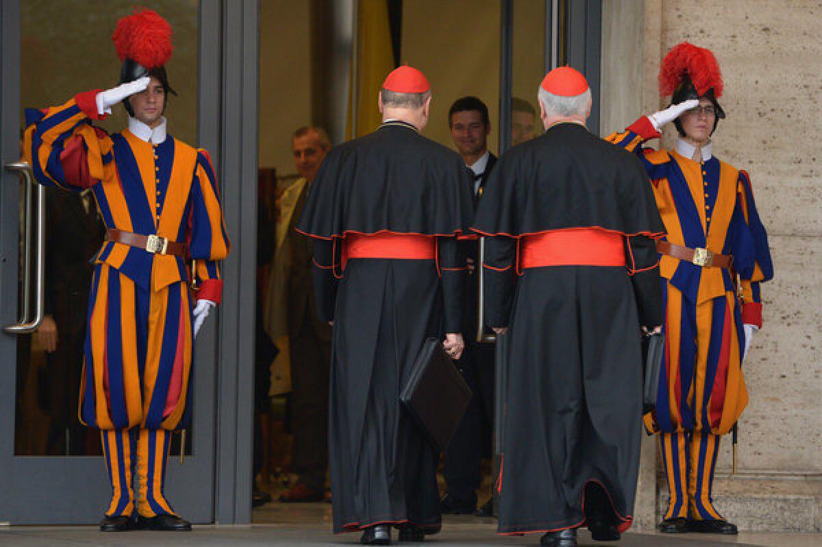 Cardinals arrive for the final congregation before they enter the conclave to vote for a new pope.