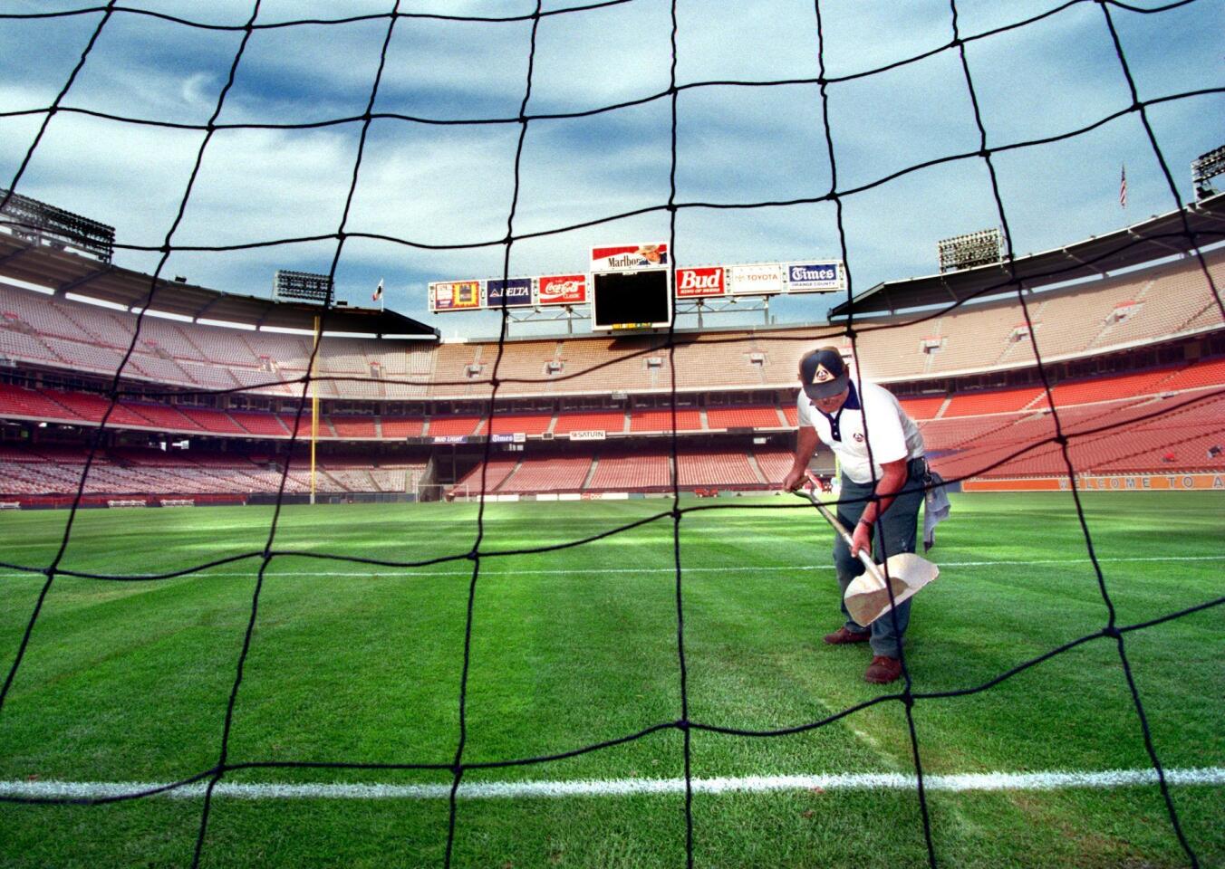Anaheim Stadium groundskeeper Brian Nofziger groomed the new turf on the field while preparing for the Gold Cup Soccer games.