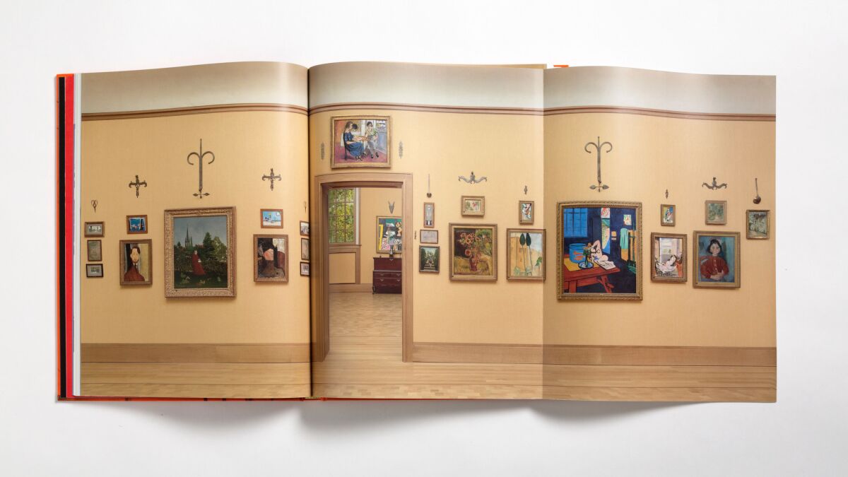 A fold-out page from "Matisse in the Barnes Foundation" shows an installation view of the Barnes collection.
