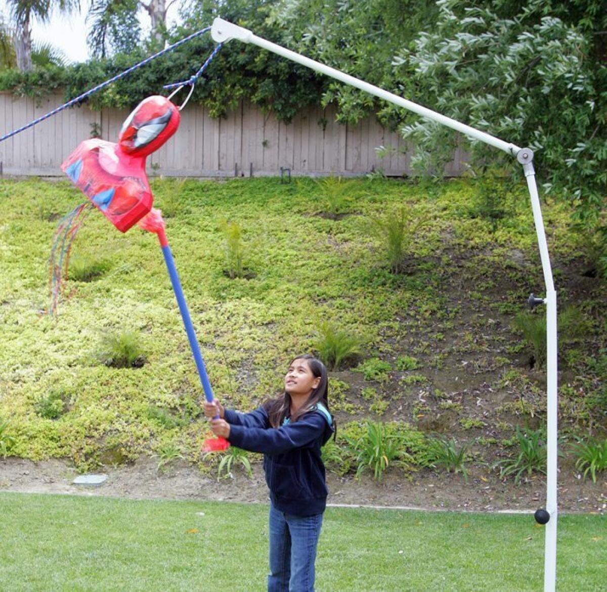 Father pins hopes on patented piñata holder - The San Diego Union-Tribune