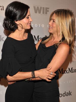 Courteney Cox-Arquette, joined by "Friends" costar Jennifer Aniston, celebrates her award for excellence in television at the Women in Film's Crystal + Lucy Awards. The ceremony was held at the Hyatt Regency Century Plaza Hotel in Los Angeles.
