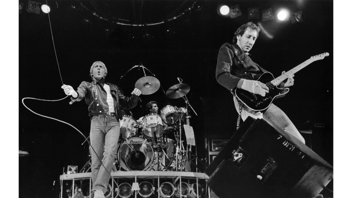 June 24, 1980: Roger Daltrey, left, drummer Kenney Jones and Pete Townshend of the Who perform at the Los Angeles Sports Arena.
