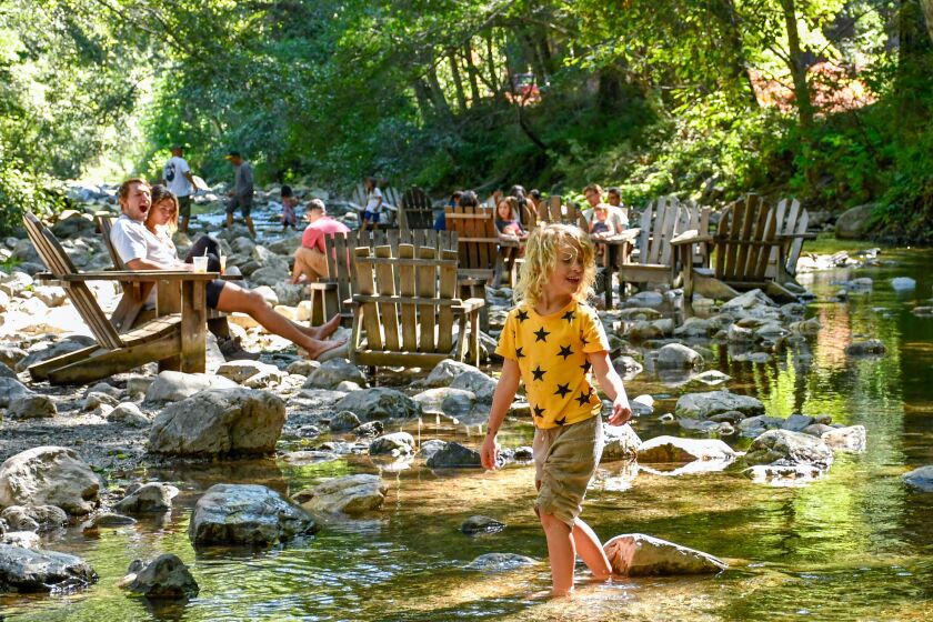 Guests of the Big Sur River Inn often sit in Adirondack chairs with their feet in the Big Sur River. This 5-year-old, Maggie, was visiting from Santa Cruz with parents Greg and Natalie Scott.