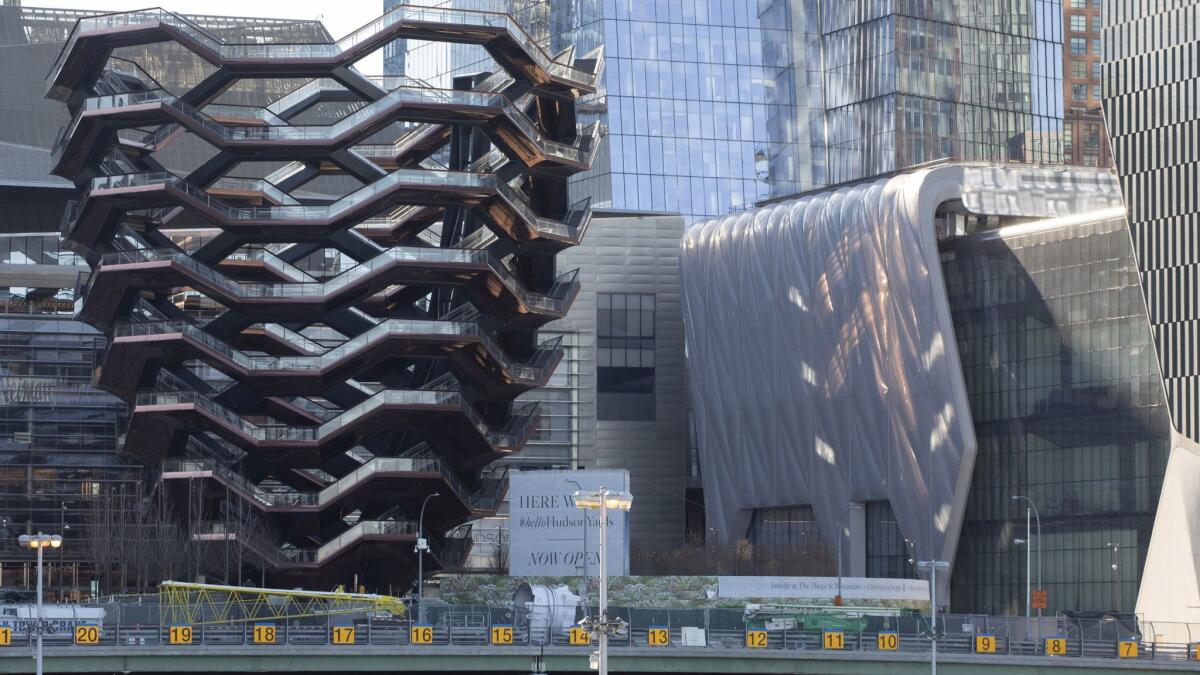 The Vessel, left, and the Shed, the latest additions to Hudson Yards, in New York.