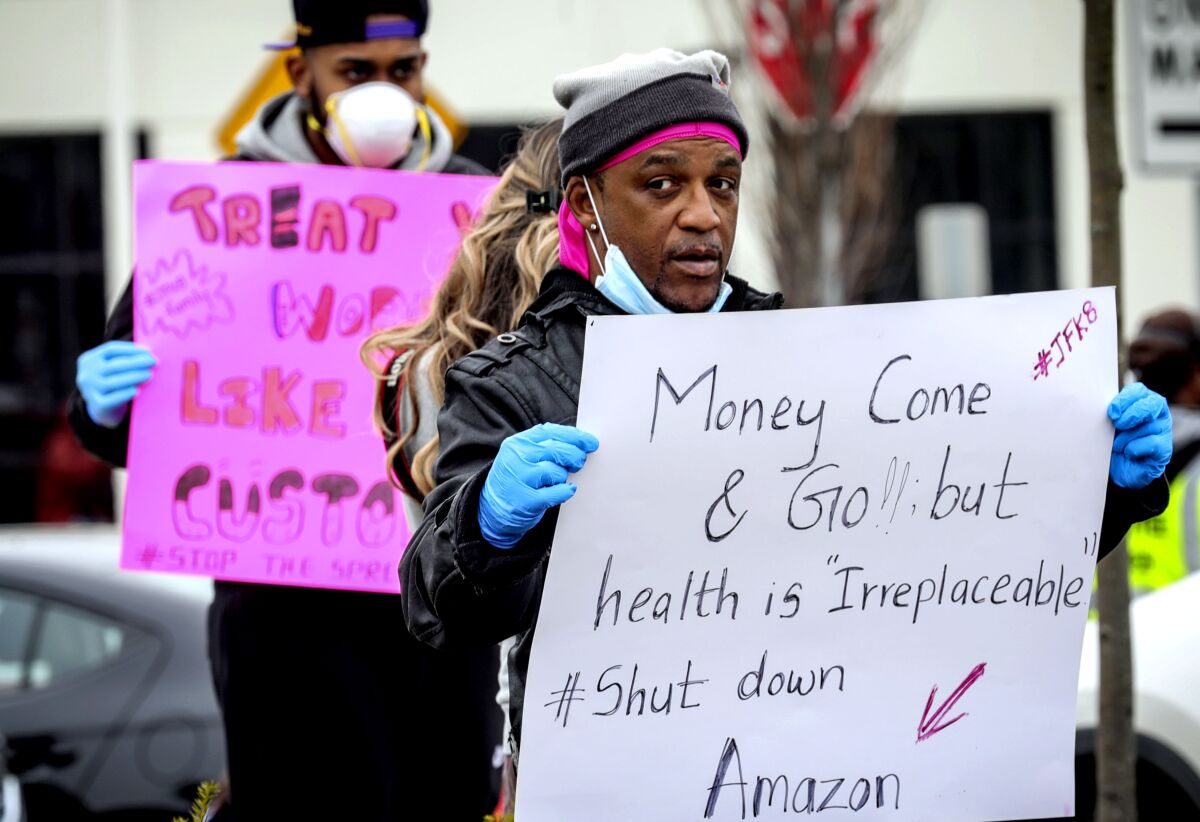 Workers at an Amazon fulfillment center in Staten Island, N.Y., protest conditions in the company's warehouse