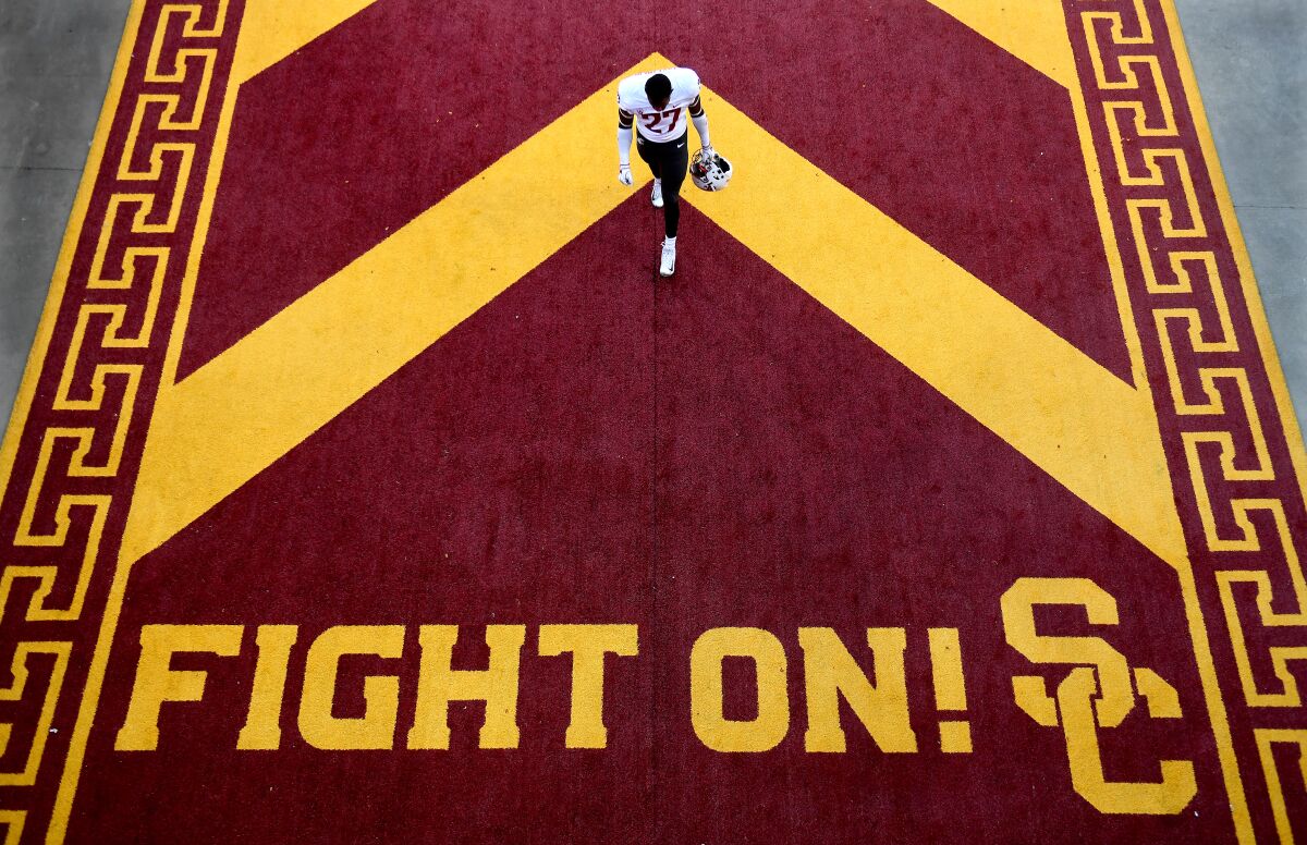 A Washington State football player walks in the tunnel area at the Coliseum during a game against USC.