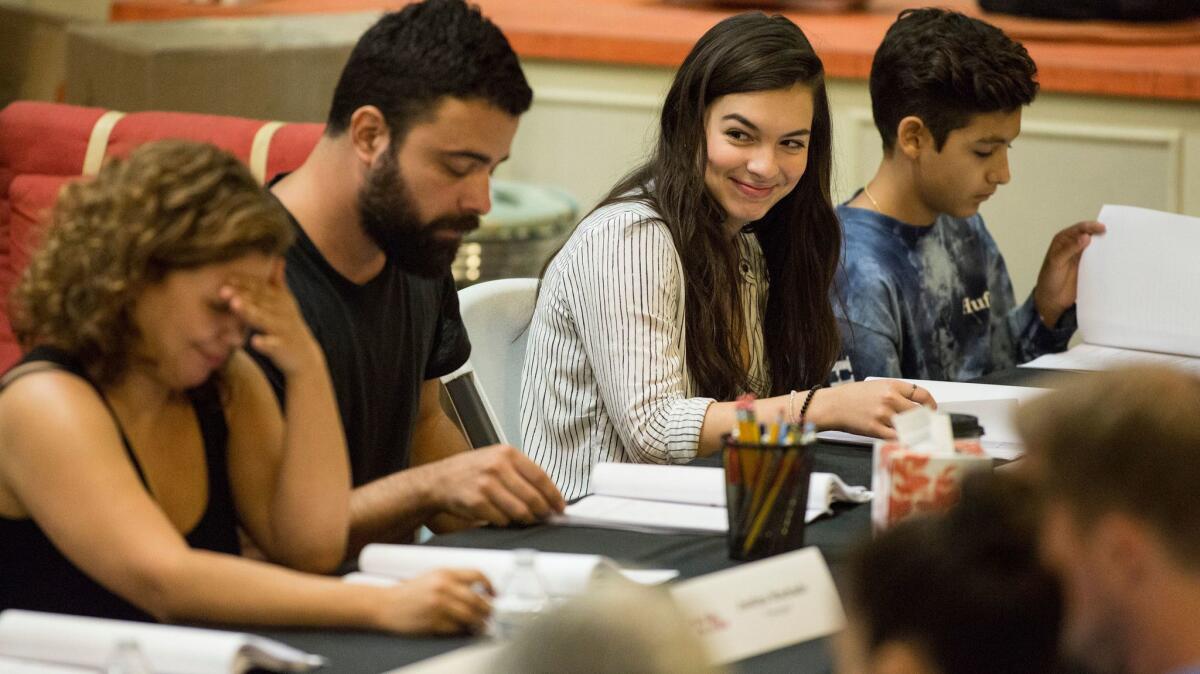 Actors Justina Machado, from left, James Martinez, Isabella Gomez and Marcel Ruiz, during a table reading for Netflix series "One Day at a Time."