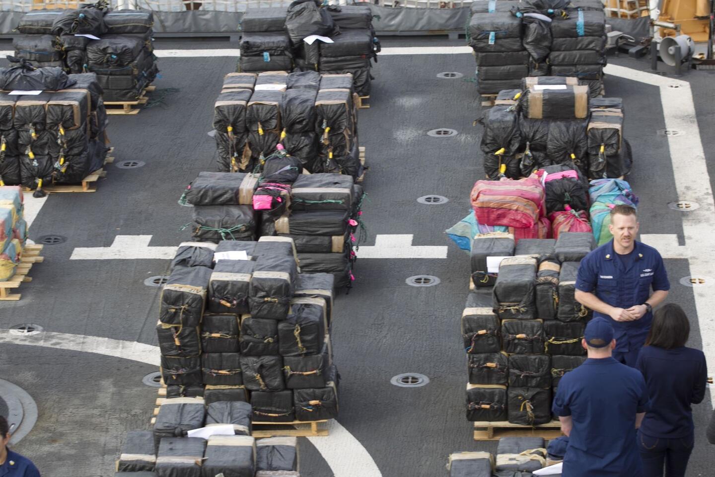 The flight deck of the USCG Cutter Stratton, which participated in the operation, had the drugs staged for unloading.