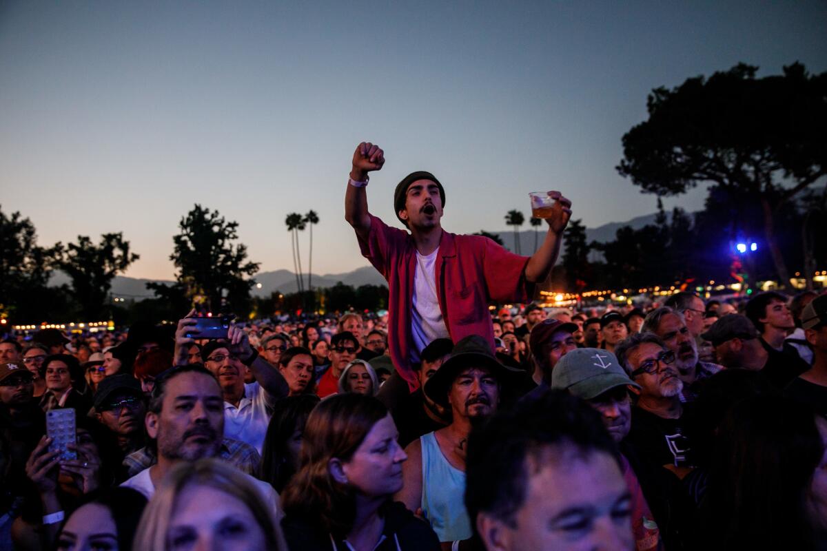 A crowd enjoys a music-filled evening Saturday at Arroyo Seco Weekend in Pasadena.