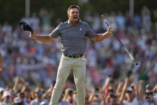 Bryson DeChambeau celebrates after winning the U.S. Open golf tournament.