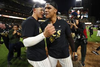 San Diego, CA - October 15: San Diego Padres' Manny Machado and Juan Soto celebrate after winning the NLDS against the Dodgers at Petco Park on Saturday, October 15, 2022 in San Diego, CA. (K.C. Alfred / The San Diego Union-Tribune)