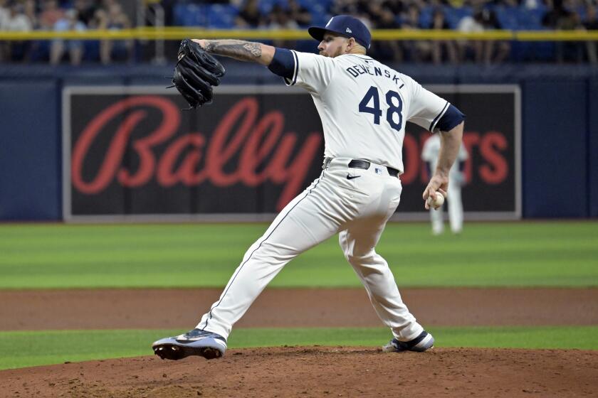 Tampa Bay Rays reliever Chris Devenski pitches against the Texas Rangers during the sixth inning of a baseball game Monday, April 1, 2024, in St. Petersburg, Fla. (AP Photo/Steve Nesius)