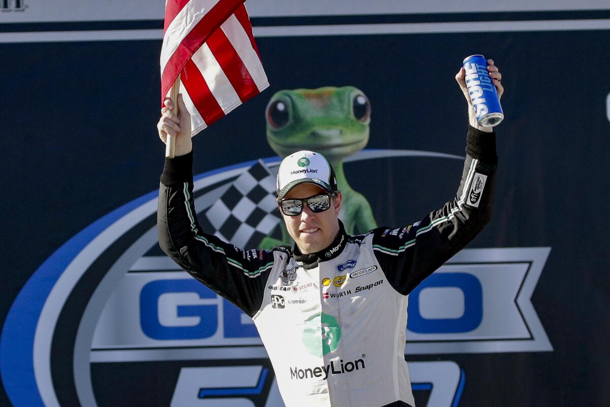 Brad Keselowski celebrates after winning the Geico 500 NASCAR Cup race at Talladega Superspeedway on Sunday.