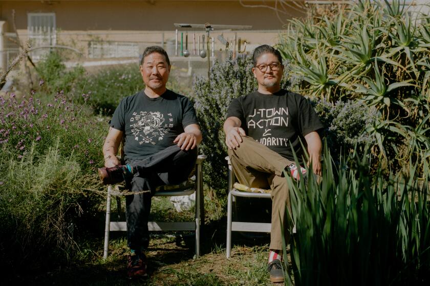 Devon Tsuno and Alan Nakagawa at Alan's home backyard "K-Town Butterfly Sanctuary".