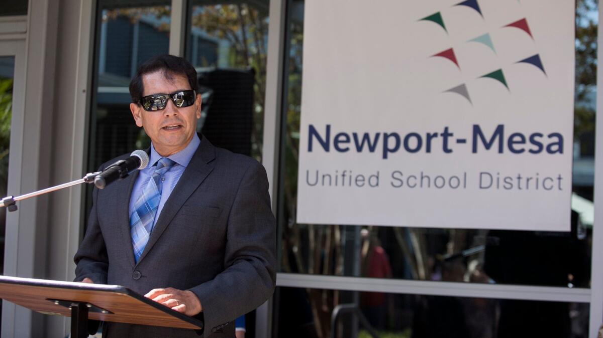 Supt. Fred Navarro speaks during a time capsule event at the Newport-Mesa Unified School District offices on Friday.