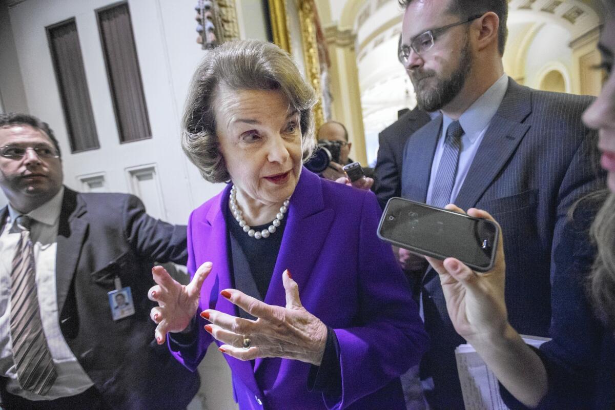 Sen. Dianne Feinstein (D-Calif.) speaks to reporters after releasing the report on the CIA's harsh interrogation methods.