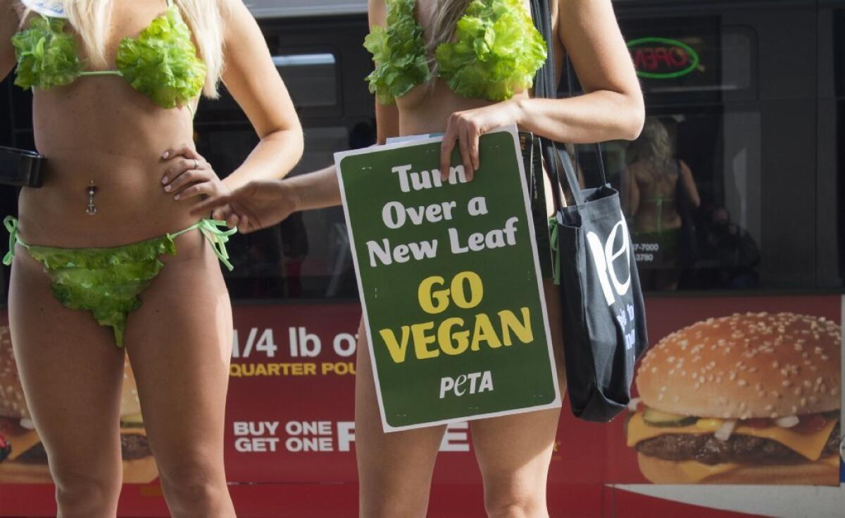 There's no chance I'll dress like these vegans demonstrating in Washington, D.C., in their lettuce suits.