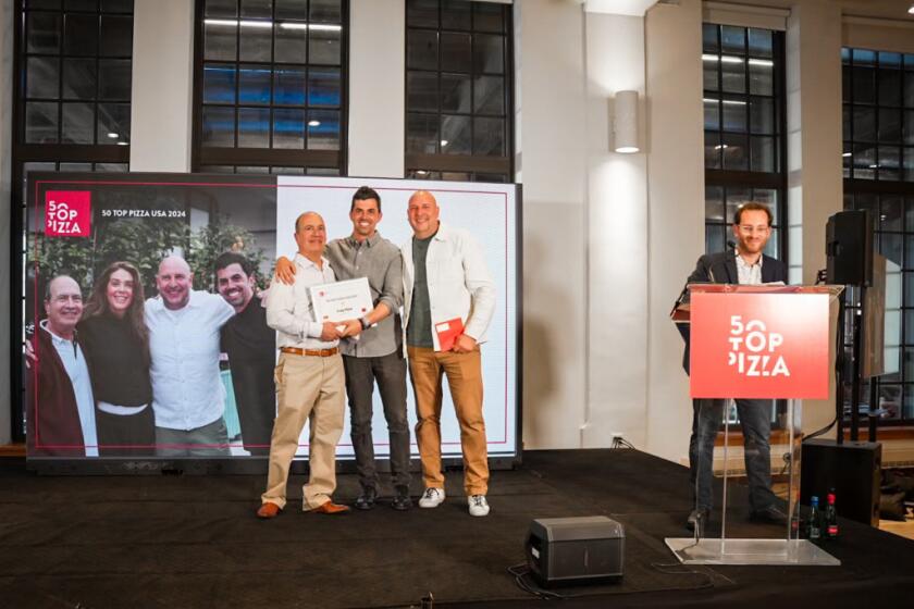John Arena, Michael Vakneen and Chris Decker of Truly Pizza at the awards ceremony for the "50 Best Pizzerias in the USA."