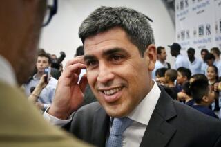 FILE - Former U.S. national team soccer captain Claudio Reyna reacts during an interview on May 22, 2013.