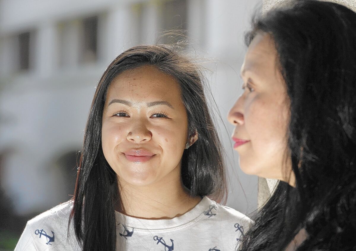 Vivian Chan, right, whose daughter Vanessa attends San Marino High School, joined Wechat about seven months ago. When news of SCA 5 broke, the phone-based group-messaging platform became a tool for fomenting action against the amendment.