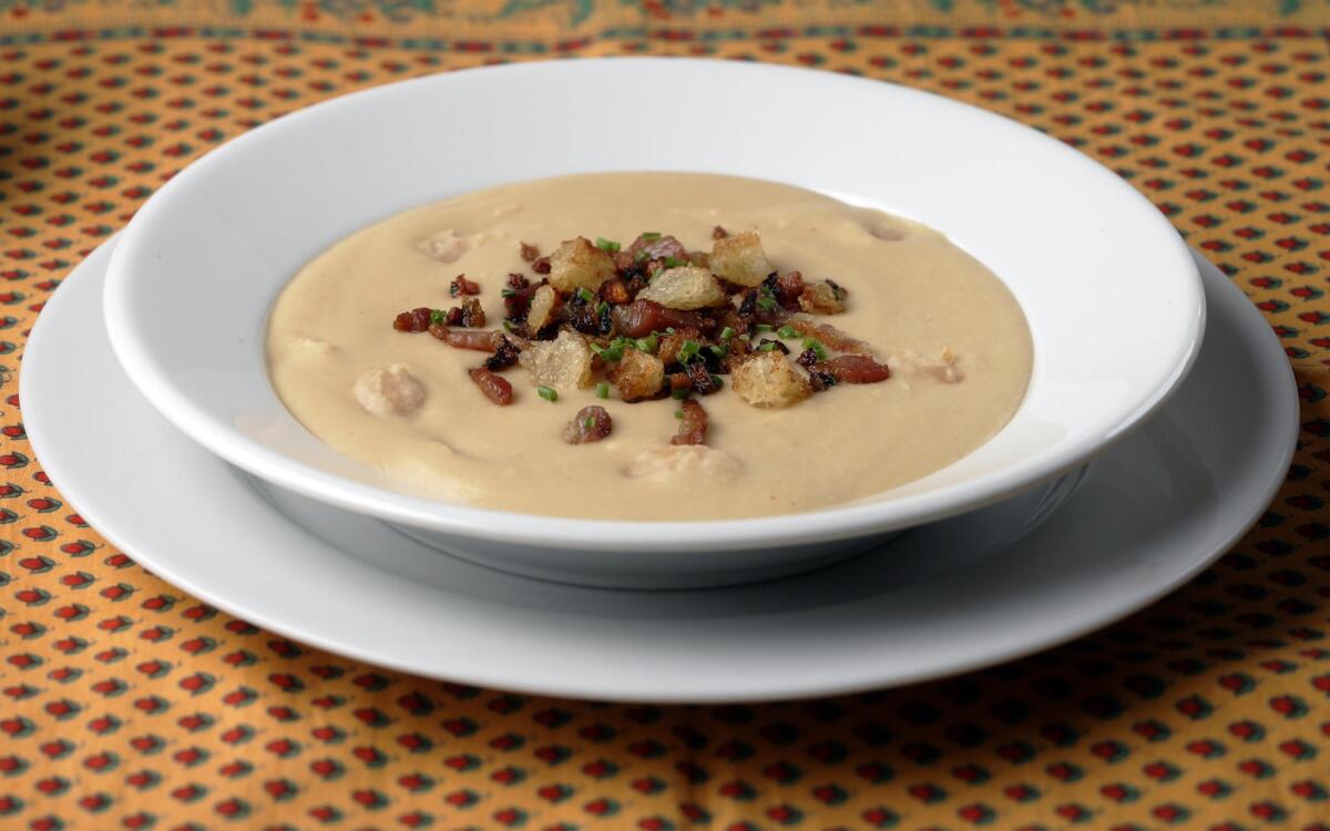 Creamy bean soup with croutons and crispy ventreche